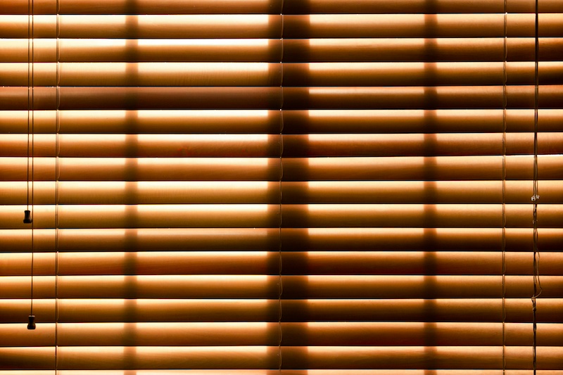 Block incoming sunlight on hot days with window treatments.